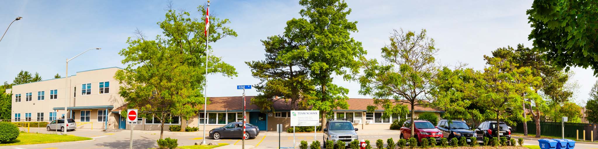 Panorama shot of front of TEAM School campus